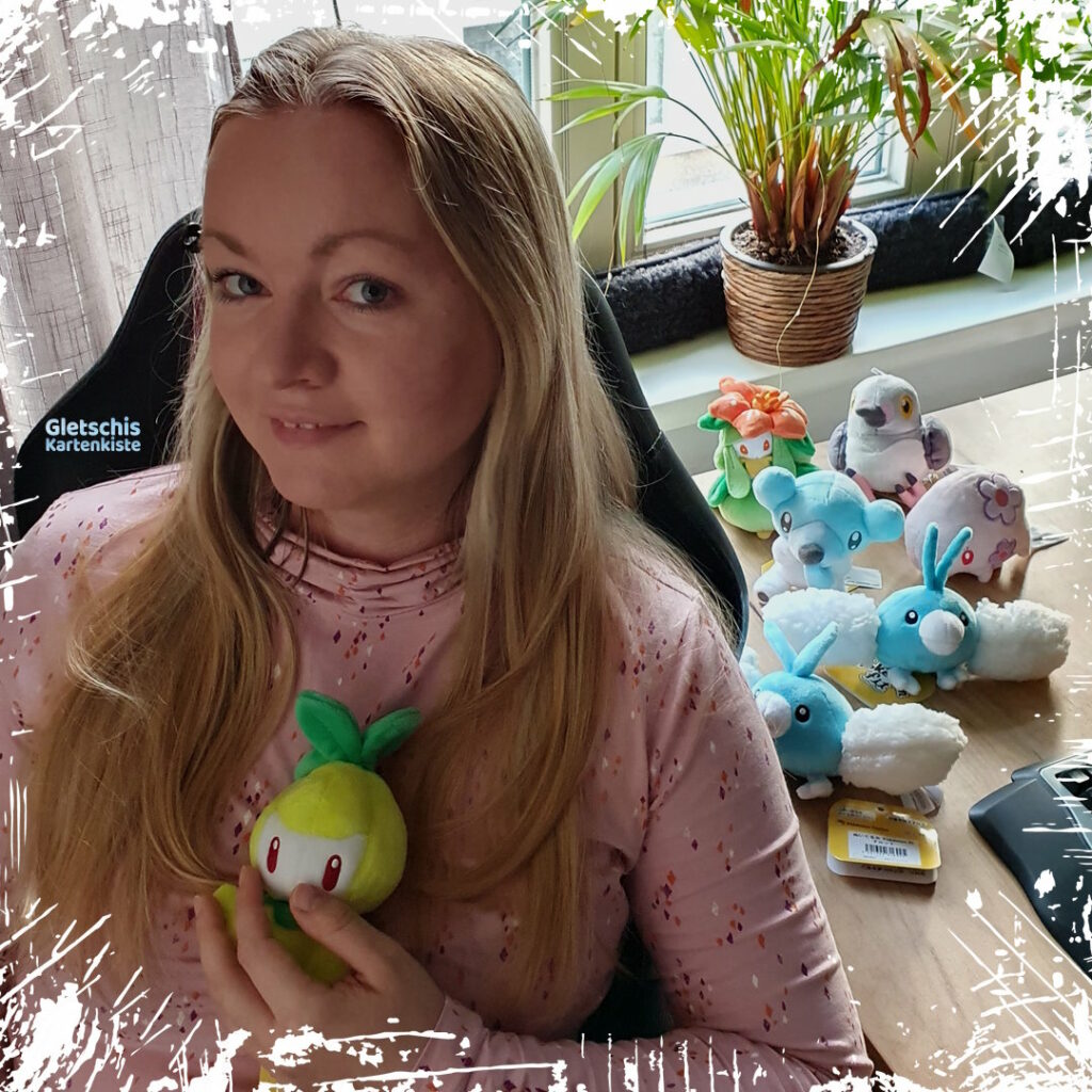 Maggie mit Pokémon fit-Plüschtieren